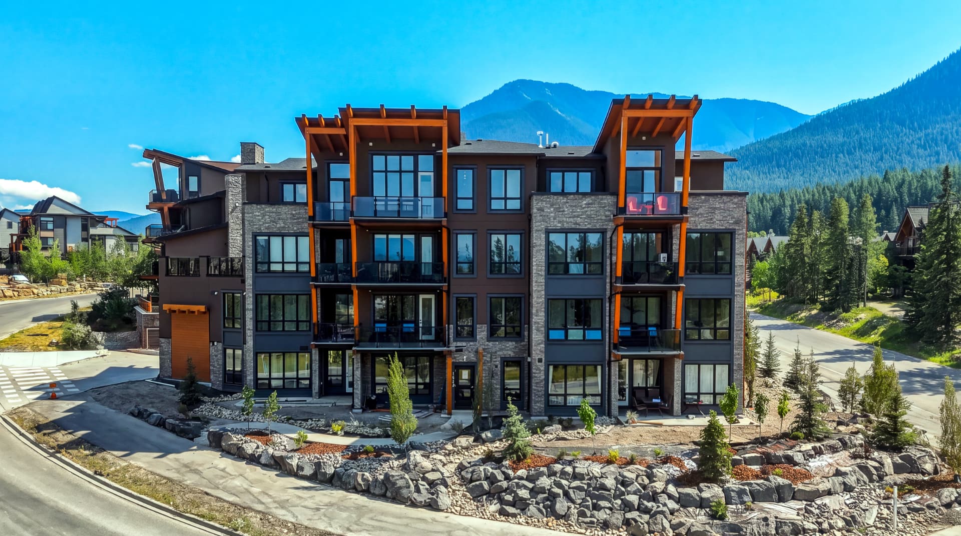The Summit Collection building exterior with timber accents