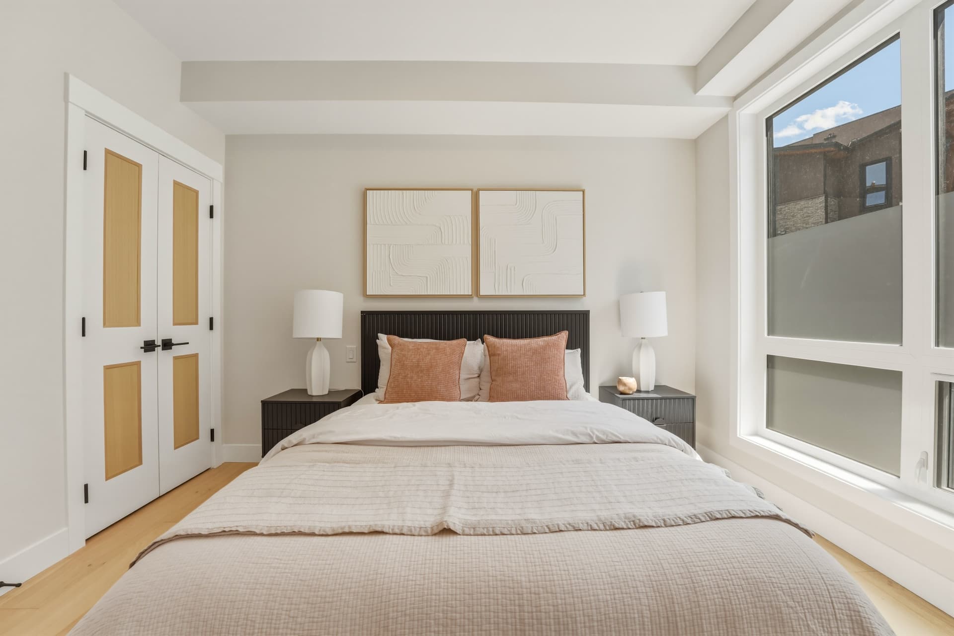 Serene primary bedroom with natural light